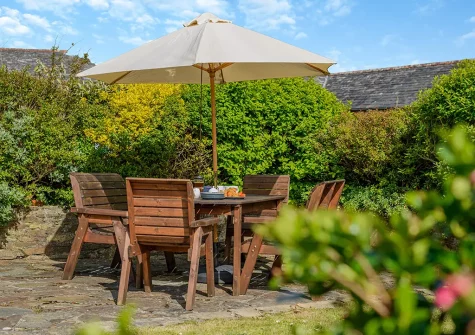The patio & alfresco dining area at Mallard Cottage, Tregolds