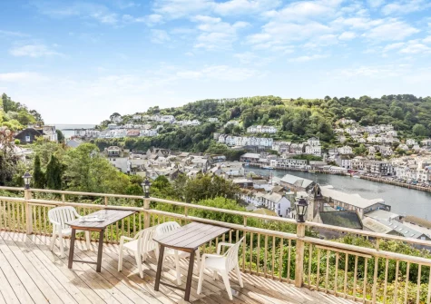The shared decked patio & outdoor sitting area at Manor House, Looe