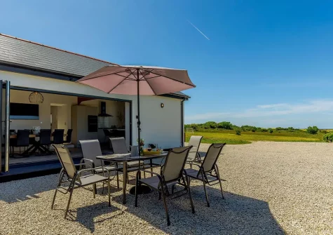 The gravelled courtyard, barbecue & alfresco dining area at Manor Meadows, Radnor