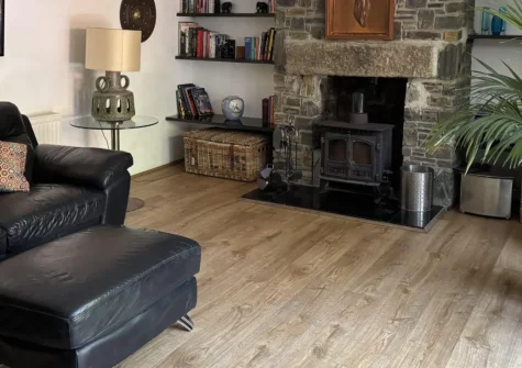 Maple Barn, Torrington is a delightful detached conversion set within five peaceful acres near Great Torrington, featuring a private six-seater hot tub, wood burner, and wildlife lake, with North Devon's stunning coast and Tarka Trail close by.