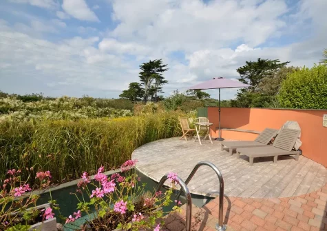The heated outdoor pool at March House, Wembury