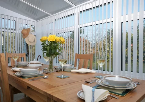 The conservatory dining area at Marily Cottage, Honiton