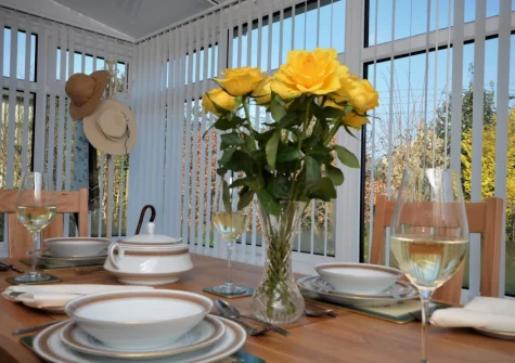 The conservatory dining area at Marily Cottage, Honiton