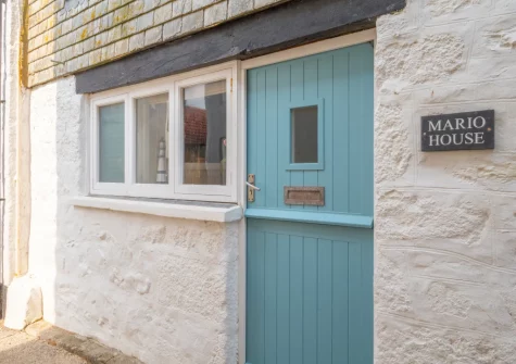 Mario House is a stylish townhouse with rustic touches, perfect for a family getaway to the coast