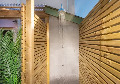 The enclosed rear patio garden & outdoor shower at Maris Cottage, St Agnes