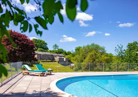 The communal outdoor swimming pool at Gitcombe Estate, Cornworthy