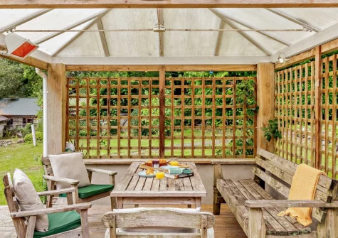 The decked patio, barbecue & alfresco dining area at Marquis House, Gulworthy