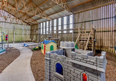 The shared indoor all weather play barn at Marsland Cottage at Cory Farm, Gooseham