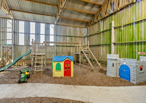 The shared indoor all weather play barn at Marsland Cottage at Cory Farm, Gooseham