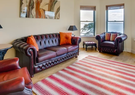 Masts B5, Torquay is a stylish two-bedroom apartment wit spectacular views across the harbour and coastline, featuring a generous private balcony perfect for alfresco dining, elegant interiors, and direct access to beaches and promenade.