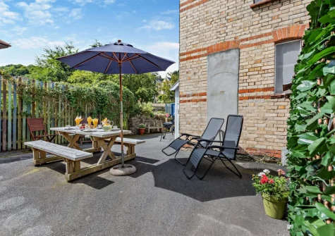 The patio, barbecue & alfresco dining area at Mayfield, Ilfracombe