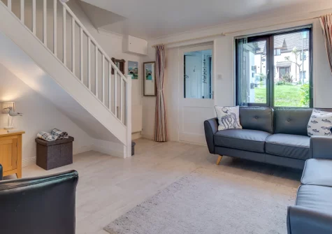 Mayflower Cottage, Padstow is a charming two-bedroom retreat, just a sort way from Padstow's vibrant harbour, featuring a sun-drenched south-facing garden with country views, fresh coastal interiors, and easy access to North Cornwall's beaches.
