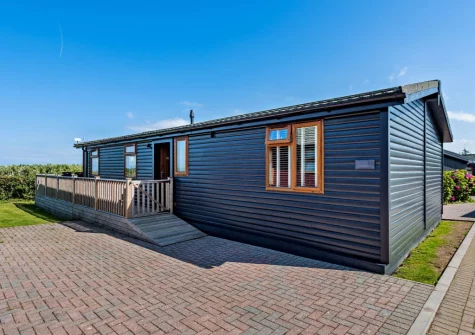 Meadow View Eleven is a beautiful & luxurious lodge uninterrupted views over the rolling countryside and sea beyond
