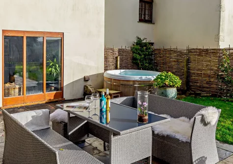 The patio, barbecue, alfresco dining area, hot tub & garden at patio, barbecue, alfresco dining area, hot tub & garden