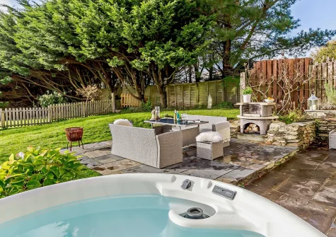 The patio, barbecue, alfresco dining area, hot tub & garden at patio, barbecue, alfresco dining area, hot tub & garden