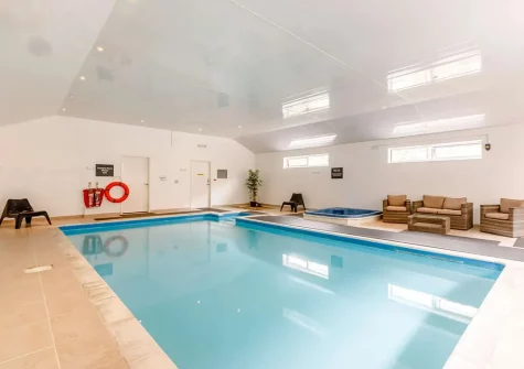 The shared indoor heated swimming pool at Meadowsweet, Berrynarbor