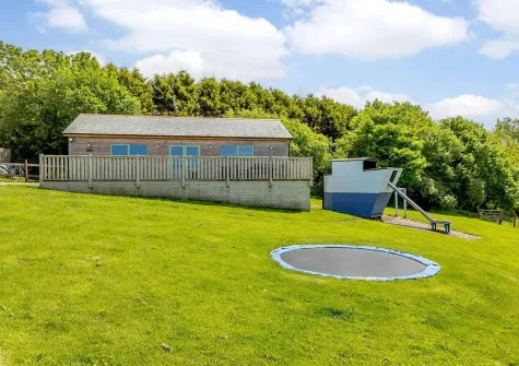 The shared games barn & children's play area at Meadowsweet, Berrynarbor