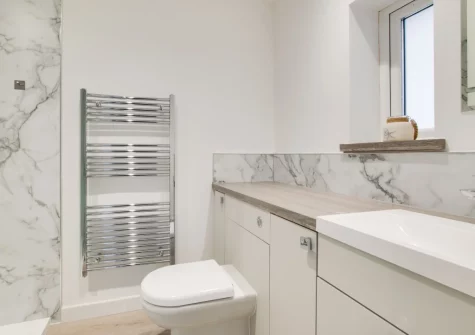 Bedroom £1 en-suite shower room at Mena-Gwins, Padstow
