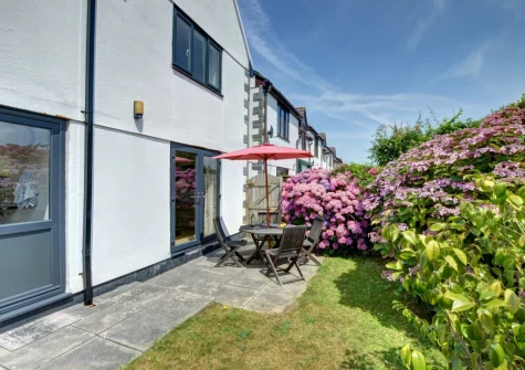 The patio, alfresco dining area & garden at Mena-Gwins, Padstow