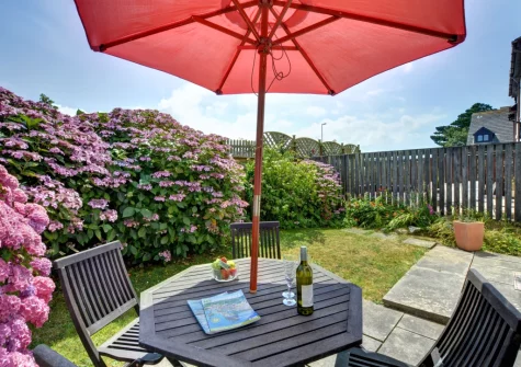 The patio, alfresco dining area & garden at Mena-Gwins, Padstow