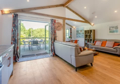 The living area & kitchen at Merlin Lodge, Winnard's Perch