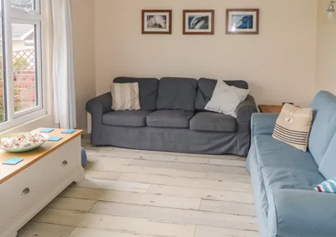 Merlin's Retreat is a charming bungalow in the picturesque and legend-filled village of Tintagel. This lovely cottage is decorated in a warm, welcoming style and has spacious living rooms, a conservatory dining room and a large enclosed garden.