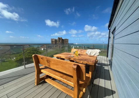The balcony & alfresco dining area at Merlins Roost, Tintagel