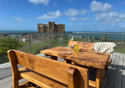 The balcony & alfresco dining area at Merlins Roost, Tintagel