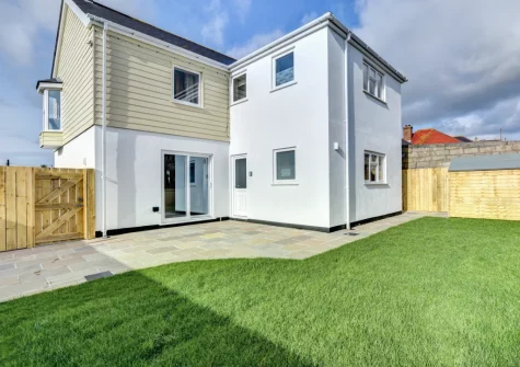 The patio, barbecue, outdoor sitting area & enclosed garden at Merlyn, Porthleven