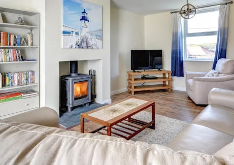 Merlyn, Porthleven is a charming five-bedroom house in the heart of this bustling harbour town, featuring a spacious enclosed garden with barbecue, handy outdoor shower, and just moments from the picturesque harbour and stunning beach.