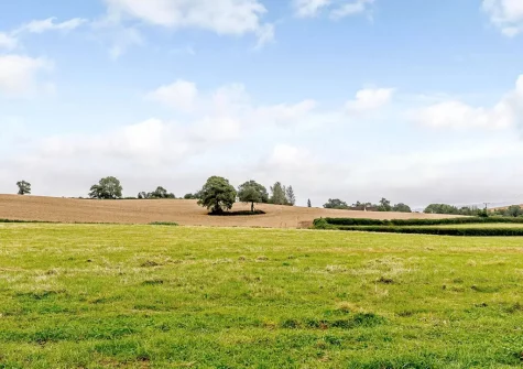 Enjoy far reaching countryside views when you stay at Merry Barn, Payhembury