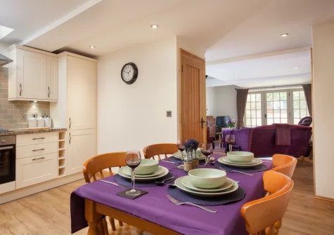 The kitchen & dining area at Mill Cottage, Cockington Village, Torquay