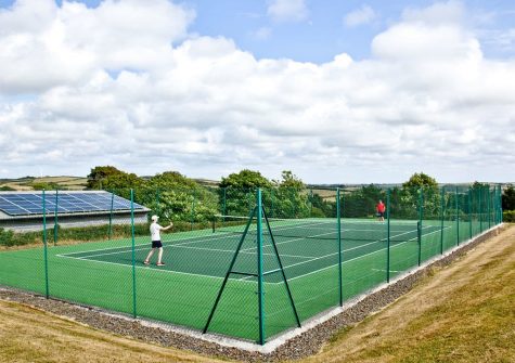 The tennis court at Wooda Farm, Bush
