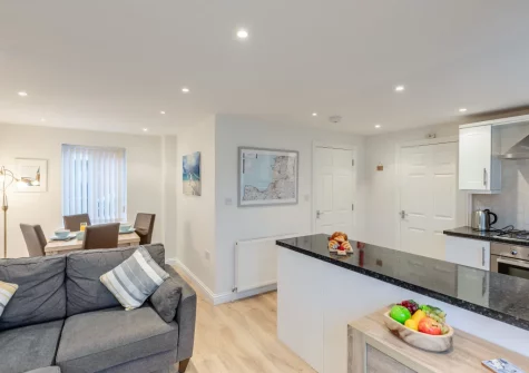 The living area & kitchen at Millrock Cottage, Woolacombe