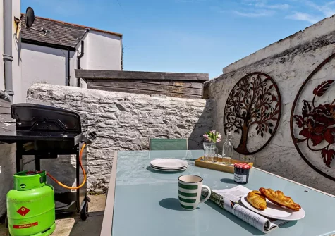 The south facing courtyard, barbecue & alfresco dining area at Mira Mare, Appledore