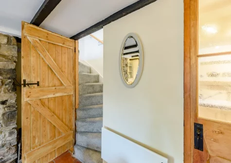 The small cottage style staircase up to the first floor at Mole End, Appledore