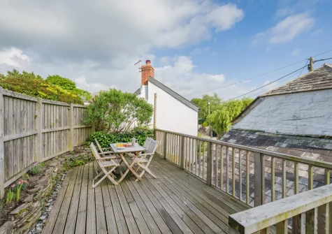 The decked patio, barbecue & alfresco dining area at Molesworth Cottage, Egloshayle