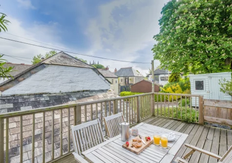 The decked patio, barbecue & alfresco dining area at Molesworth Cottage, Egloshayle