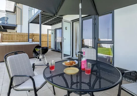 The patio & outdoor sitting area at Mondeville, Westward Ho!
