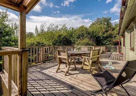The decked patio & alfresco dining area at Monterey Lodge, Forest Lakes, Woolfardisworthy