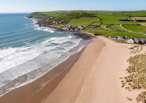 Croyde's beautiful horseshoe-shaped bay is ideal for families with its golden sands, gentle waves & fascinating rock pools to explore