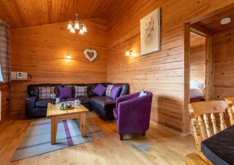 The living area at Moorhen Lodge 18 at Clovelly Lakes, Higher Clovelly