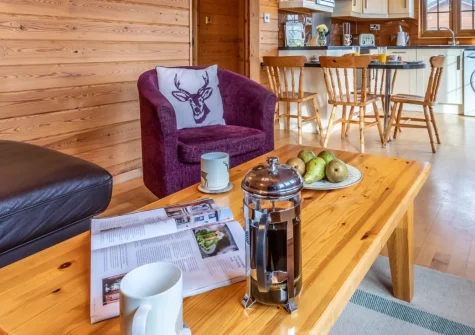 Moorhen Lodge 18 at Clovelly Lakes, Higher Clovelly is a peaceful single-storey lakeside retreat set within 40 acres of natural beauty, featuring a private balcony overlooking tranquil fishing lakes, and easy access to North Devon's coast.