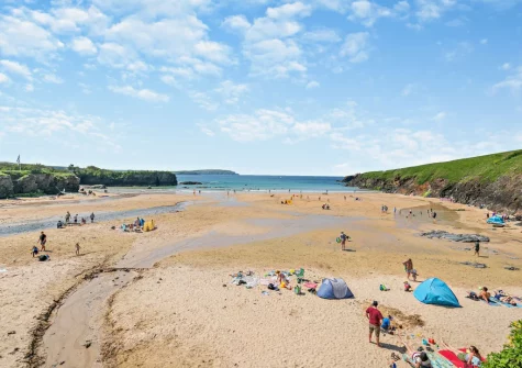 Trevone Beach offers a glorious sandy beach perfect for families and surfers alike, with dramatic cliffs framing this stunning Trevone coastal gem
