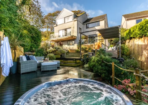 The decked patio, outdoor sitting area & hot tub at Morva, Carbis Bay