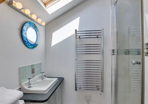 The en-suite shower room at Morvoren Cottage, Trewellard