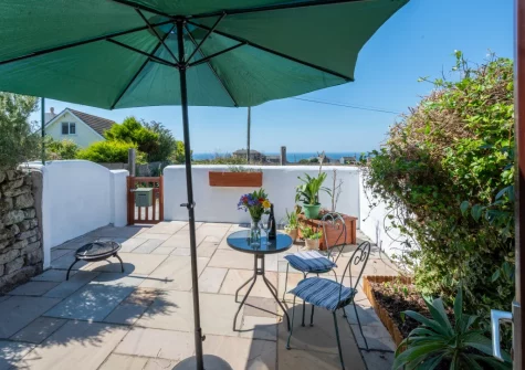 The patio & outdoor sitting area at Morvoren Cottage, Trewellard