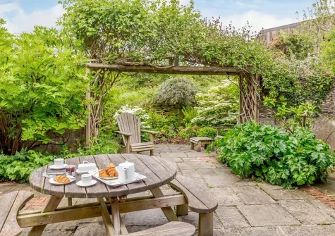 The patio, alfresco dining & outdoor sitting area at South Torfrey Farm, Golant