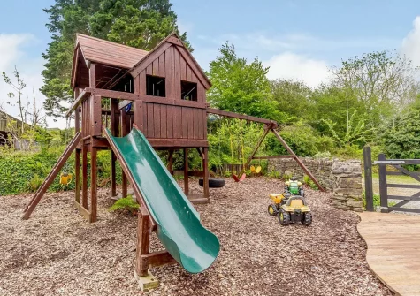 The shared children's play area at Mulberry, South Torfrey Farm, Golant