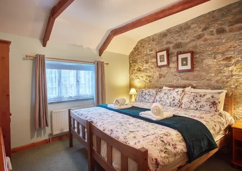 Bedroom #1 at Mum's Cottage, Cheesewring Farm, Minions